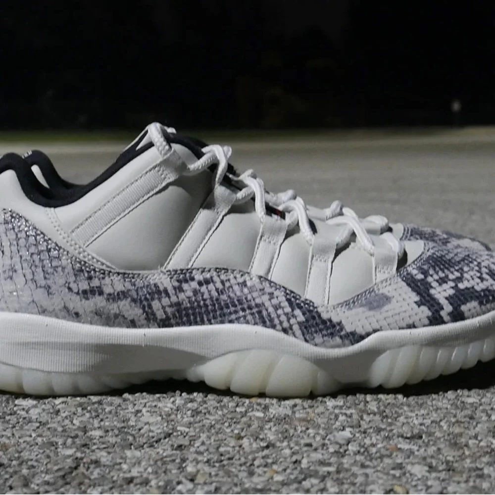 The Air Jordan 11 Low LE “Snakeskin” sz 11.5